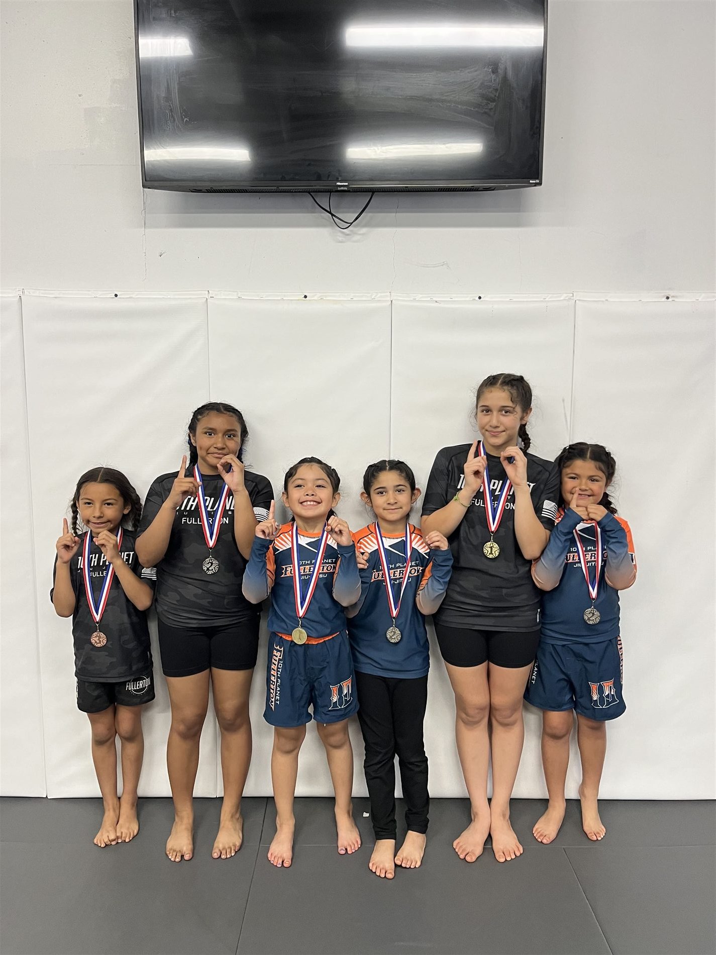 Youth jiu-jitsu competition team with medals at 10th Planet Boise